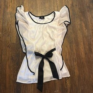 White and black shirt with belt